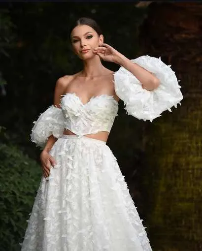 Feather Appliqué by Karmen Aksu